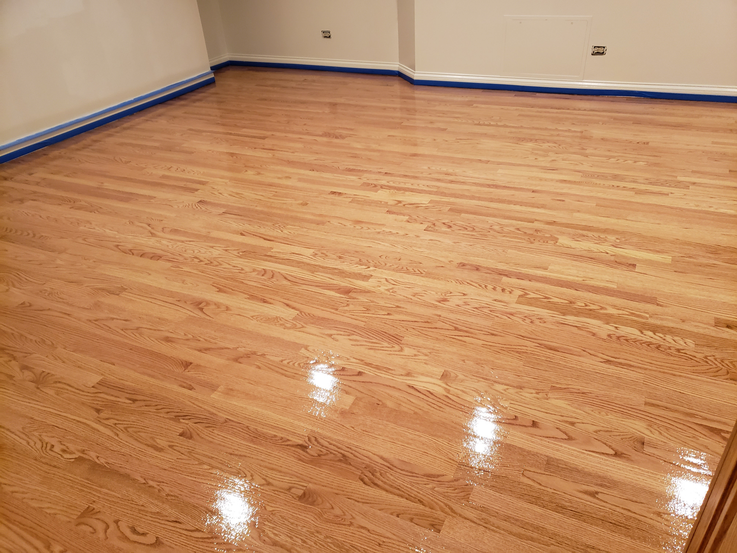 Mount Prospect,  2 and 1/4 red oak installed over radiant heat 3 coats Bona Mega