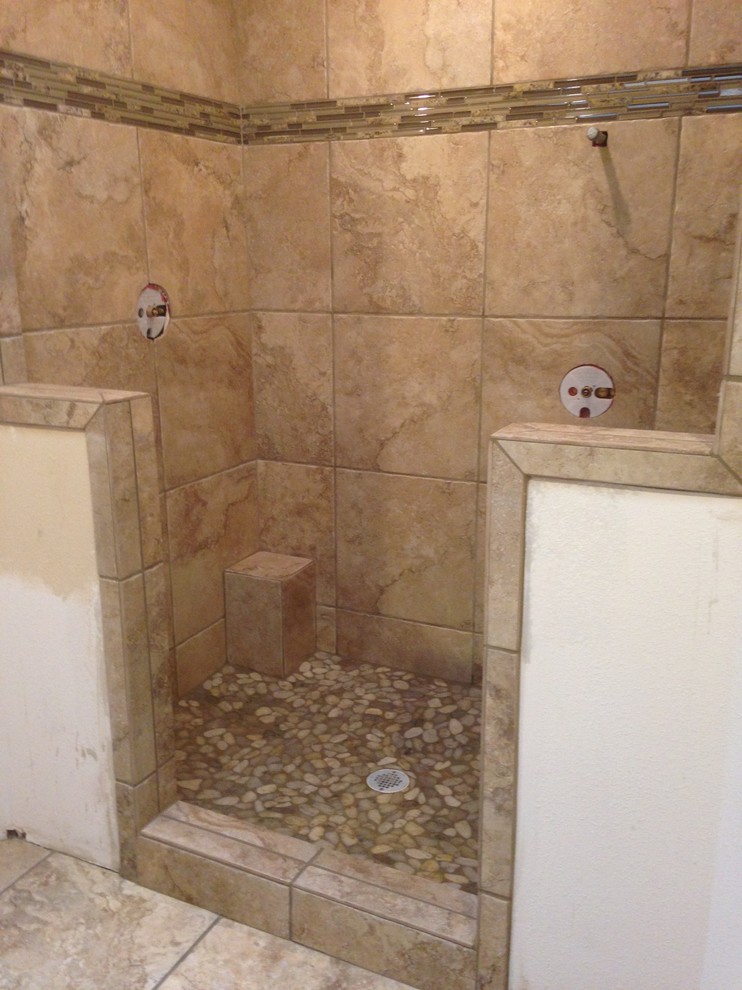Mid-sized traditional bathroom in Austin with an open shower, beige tile, travertine and pebble tile floors.