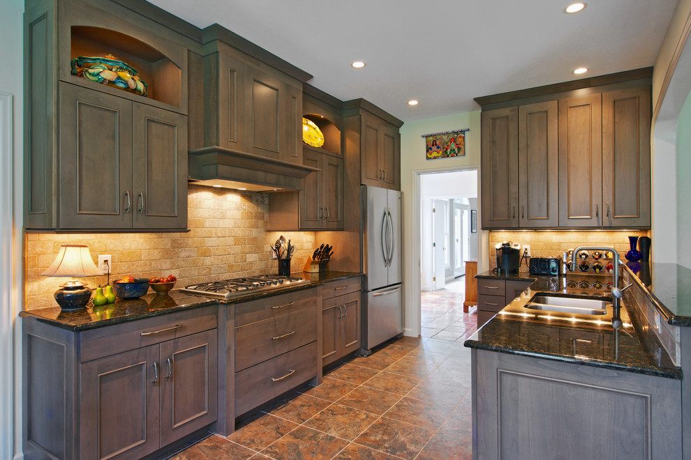 Mid-sized transitional galley ceramic tile eat-in kitchen photo with recessed-panel cabinets, beige backsplash, a double-bowl sink, subway tile backsplash, stainless steel appliances, light wood cabinets, granite countertops and a peninsula