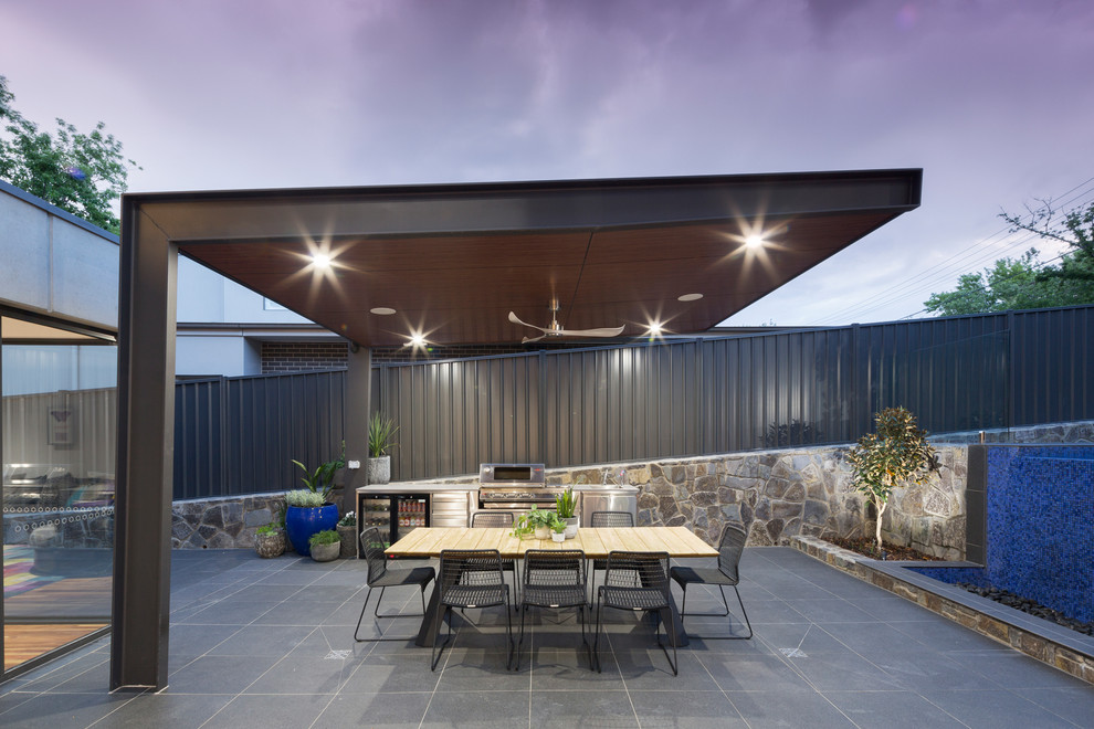Design ideas for a contemporary backyard patio in Canberra - Queanbeyan with a pergola.