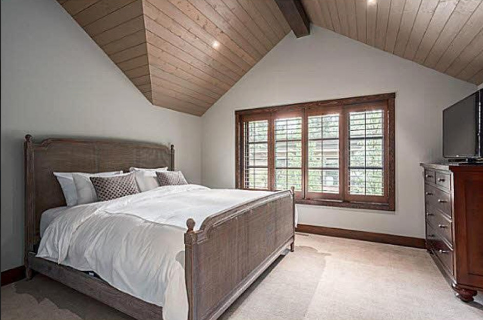 Inspiration for a mid-sized transitional master carpeted and beige floor bedroom remodel in Vancouver with white walls and no fireplace