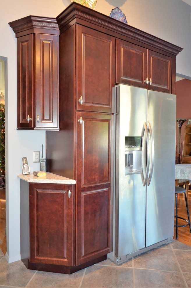 Example of a transitional kitchen design in New York