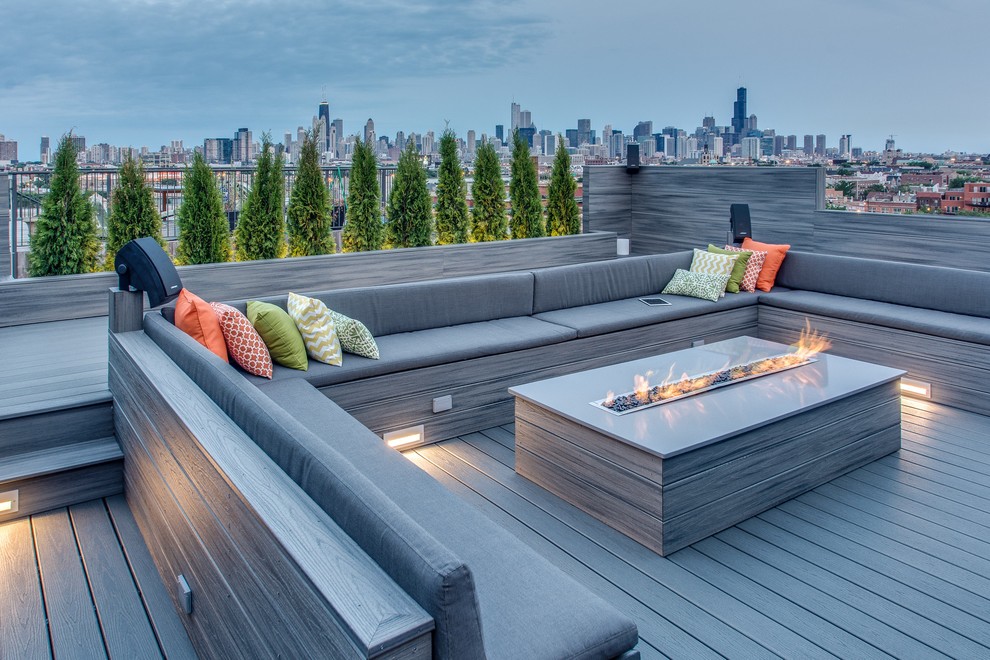 Inspiration for a large contemporary rooftop and rooftop deck in Chicago with a fire feature and no cover.