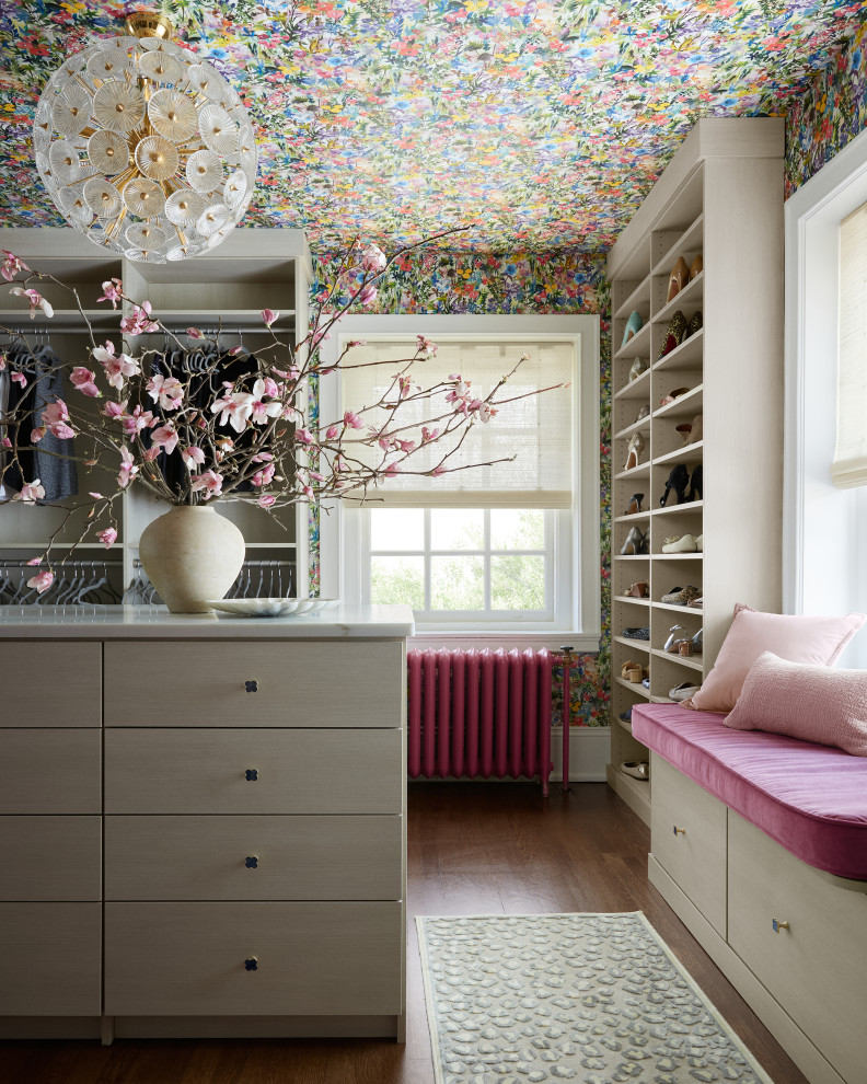 Transitional women's dark wood floor, brown floor and wallpaper ceiling walk-in closet photo in Philadelphia with open cabinets and light wood cabinets