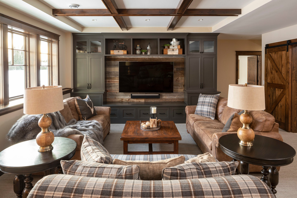 Inspiration for a traditional family room in Minneapolis with beige walls, carpet, no fireplace and beige floor.
