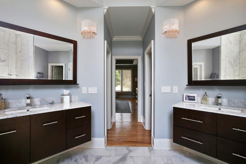 Large contemporary master bathroom in Atlanta with flat-panel cabinets, brown cabinets, an open shower, a one-piece toilet, gray tile, marble, blue walls, marble floors, an undermount sink, marble benchtops, grey floor, an open shower and grey benchtops.