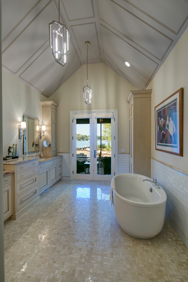 Inspiration for a traditional master bathroom in Grand Rapids with a freestanding tub.