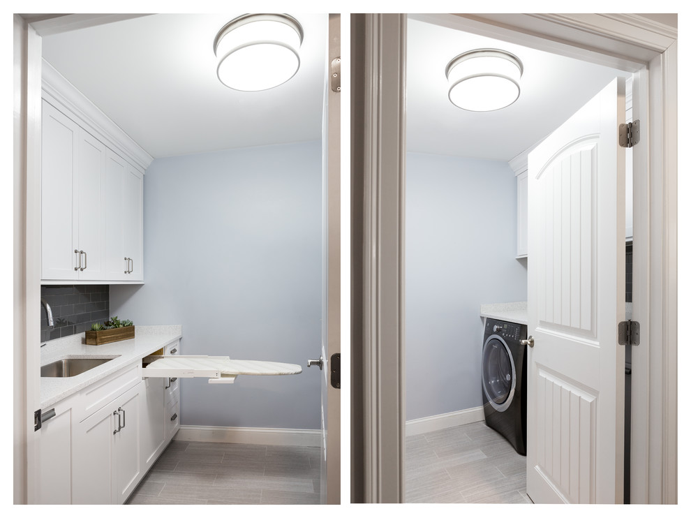 Design ideas for a small transitional galley laundry room in Boston with an undermount sink, shaker cabinets, white cabinets, solid surface benchtops, blue walls, ceramic floors and a side-by-side washer and dryer.