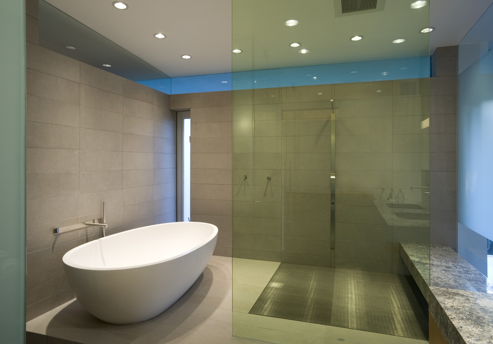 This is an example of a contemporary bathroom in Los Angeles with an open shower and an open shower.