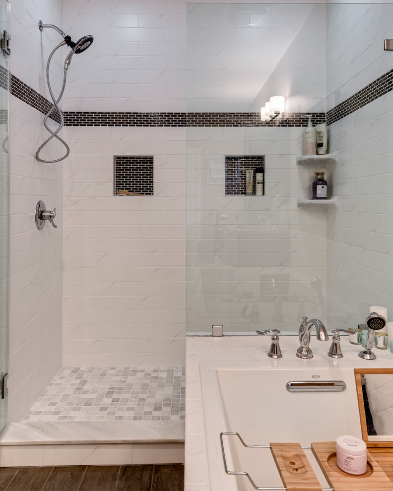 Photo of a mid-sized contemporary master bathroom in Columbus with an undermount sink, recessed-panel cabinets, dark wood cabinets, granite benchtops, a drop-in tub, an open shower, a two-piece toilet, brown tile, ceramic tile, beige walls and ceramic floors.