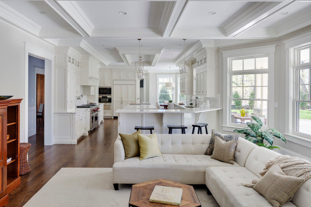 Inspiration for a mid-sized country open concept family room in Boston with grey walls and medium hardwood floors.