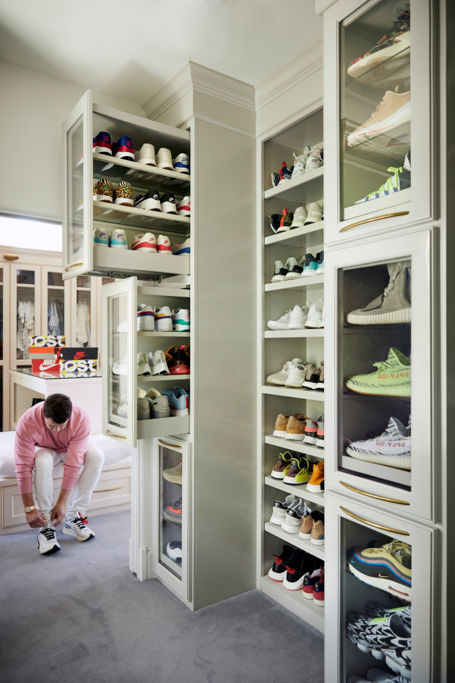 This is an example of a mediterranean storage and wardrobe in Dallas.