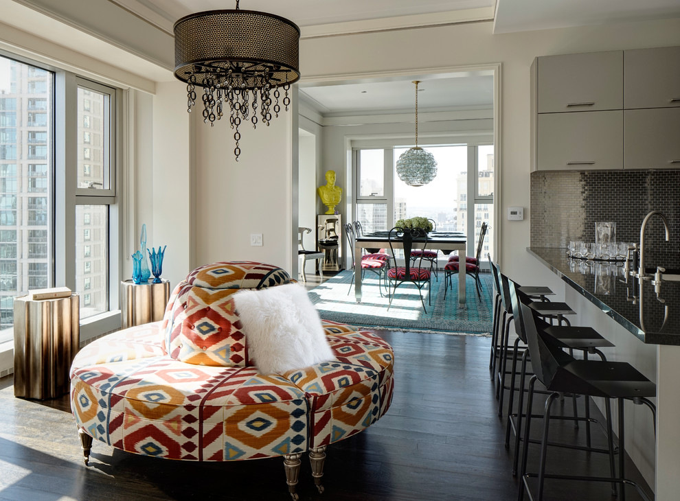 This is an example of an eclectic living room in Chicago with dark hardwood floors.