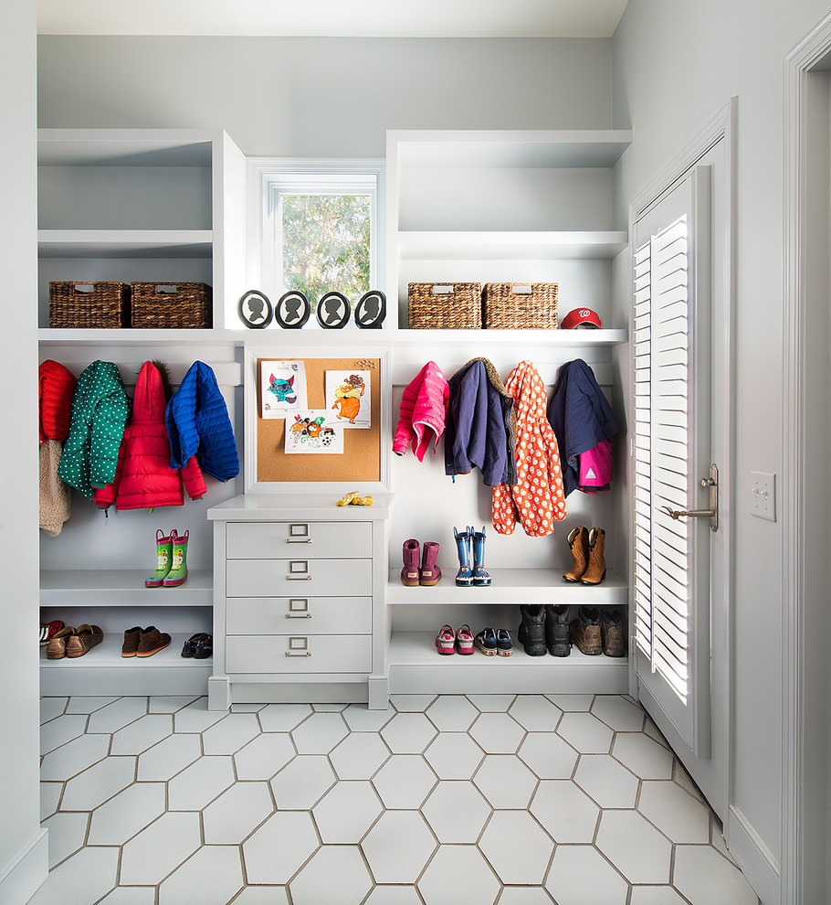 Transitional mudroom in DC Metro with grey walls, a single front door and a glass front door.
