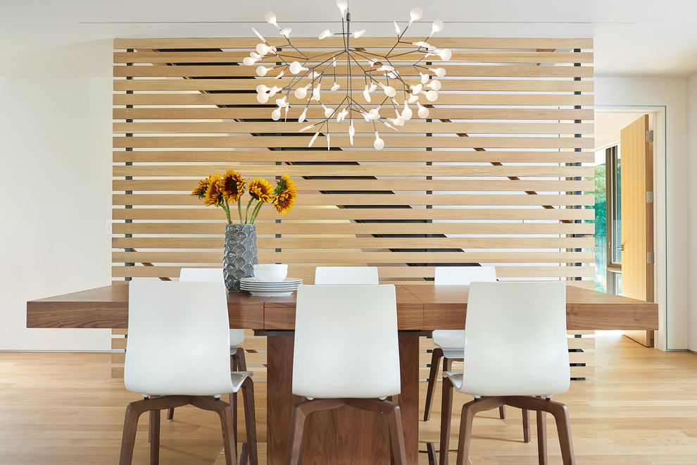 This is an example of a contemporary dining room in Grand Rapids.