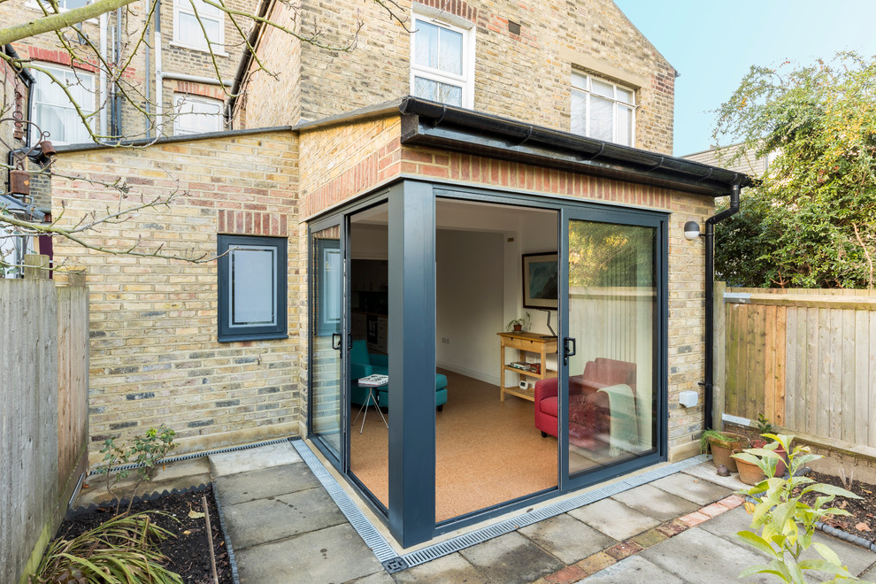 This is an example of a small transitional patio in London.