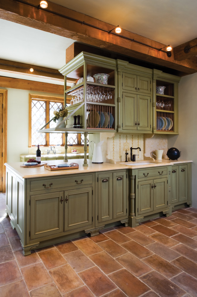 Photo of a mediterranean kitchen in San Francisco with beaded inset cabinets.