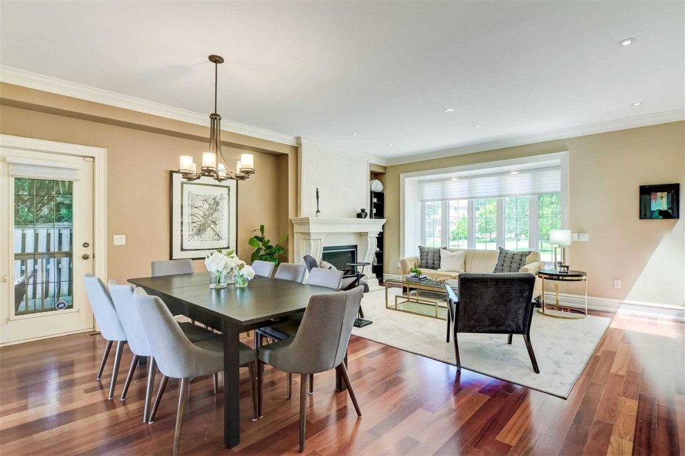 Example of a transitional home design design in Toronto