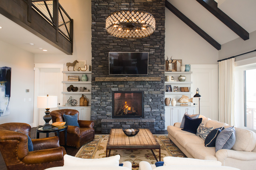 Inspiration for a large country open concept family room in Portland with dark hardwood floors, brown floor, grey walls, a ribbon fireplace and a stone fireplace surround.