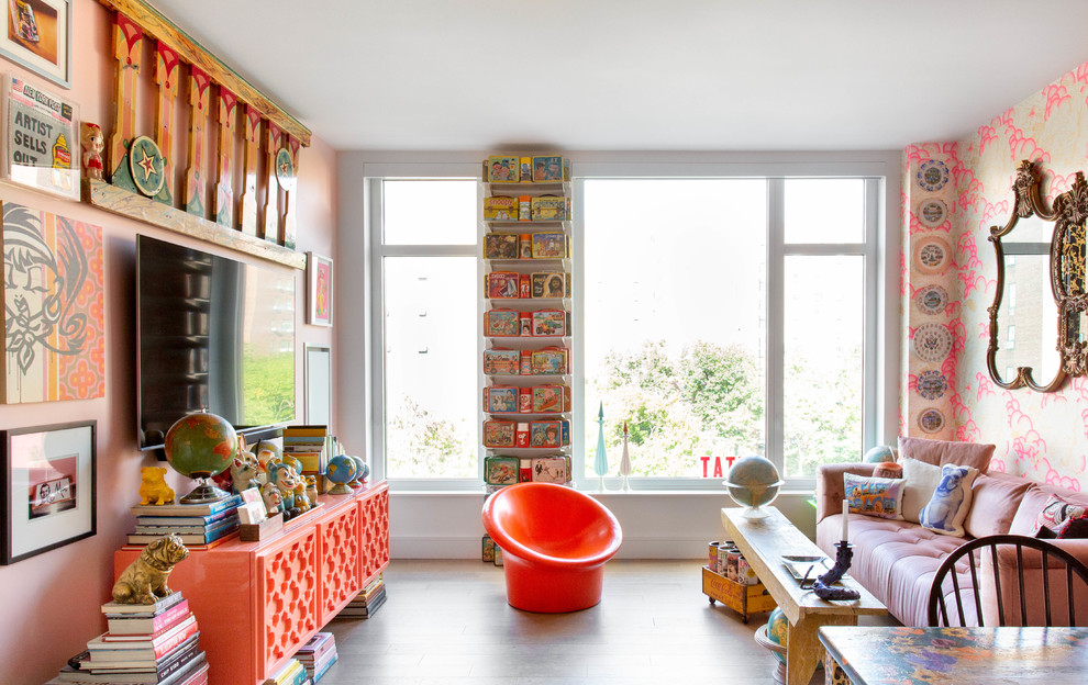 Photo of a mid-sized eclectic open concept family room in New York with multi-coloured walls and a wall-mounted tv.