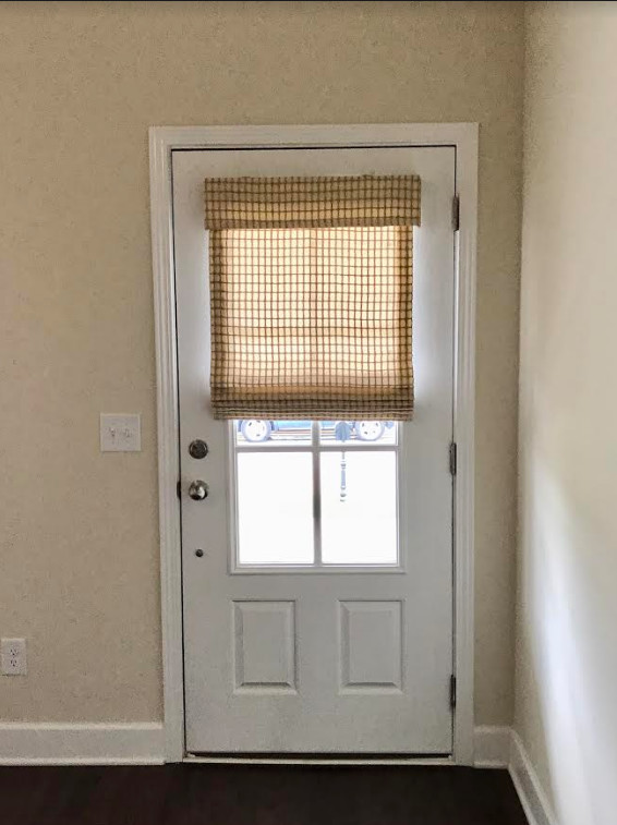 Traditional front door in Atlanta with beige walls, a single front door and a white front door.