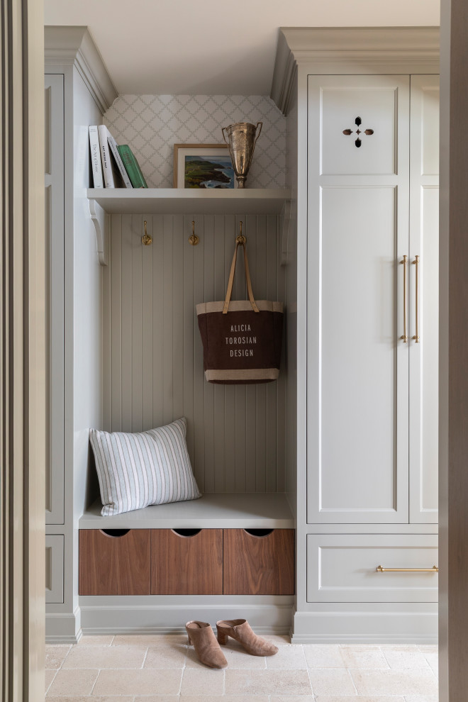 Mudroom - coastal limestone floor, beige floor and wallpaper mudroom idea in Orange County with gray walls