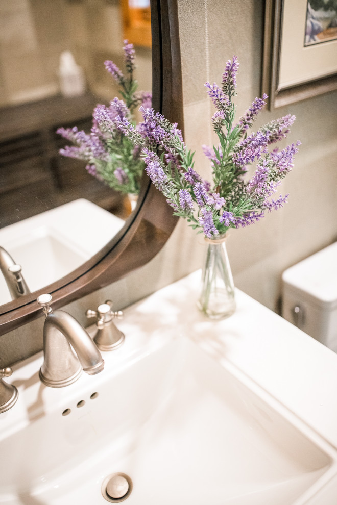 Example of a transitional home design design in Denver