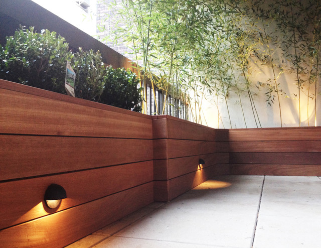 Terrace with custom planter box built with mahogany wood