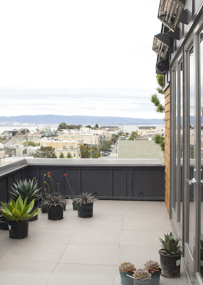 This is an example of a contemporary balcony in San Francisco with no cover.