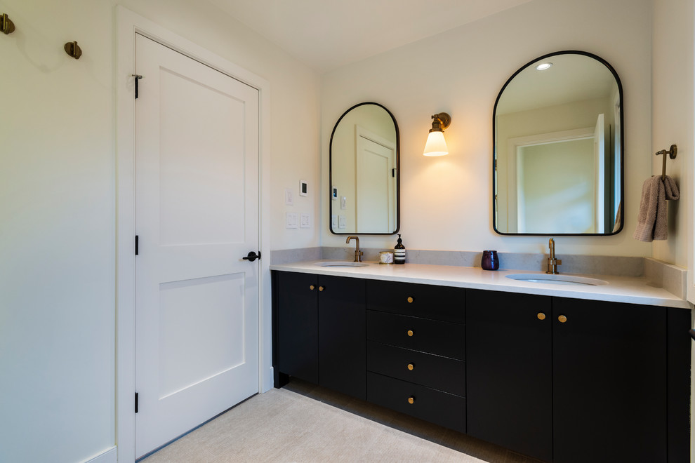 Mid-sized mountain style master porcelain tile and gray floor bathroom photo in Vancouver with flat-panel cabinets, black cabinets, white walls, an undermount sink, quartz countertops and gray countertops