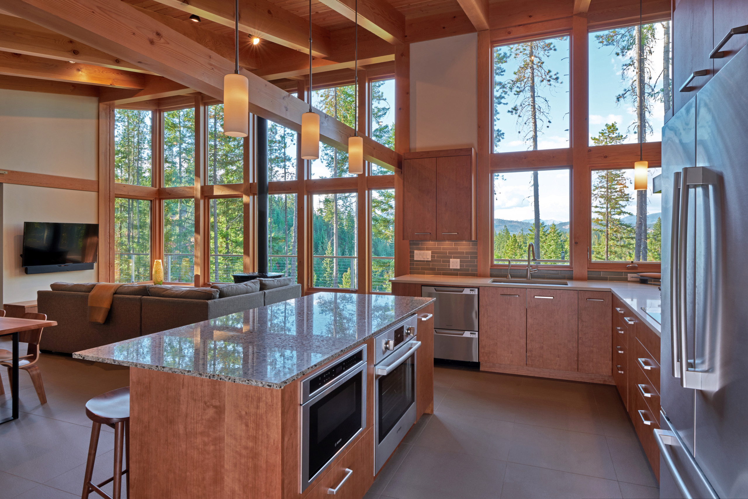 Another view of the kitchen with microwave and oven built in to the island.