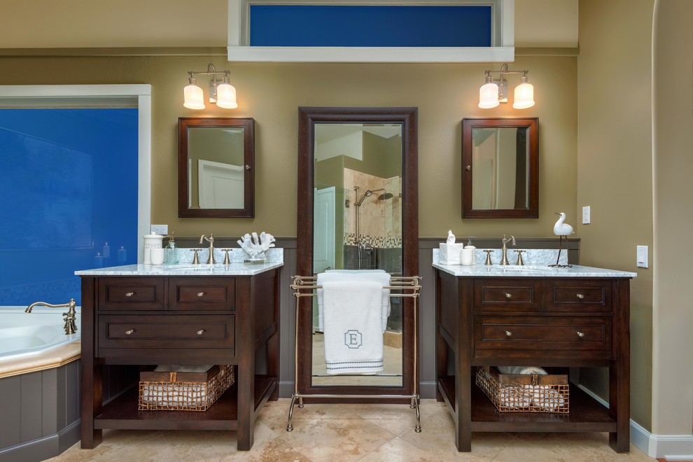 Small transitional master multicolored tile and mosaic tile ceramic tile drop-in bathtub photo in Phoenix with recessed-panel cabinets, dark wood cabinets, beige walls and marble countertops