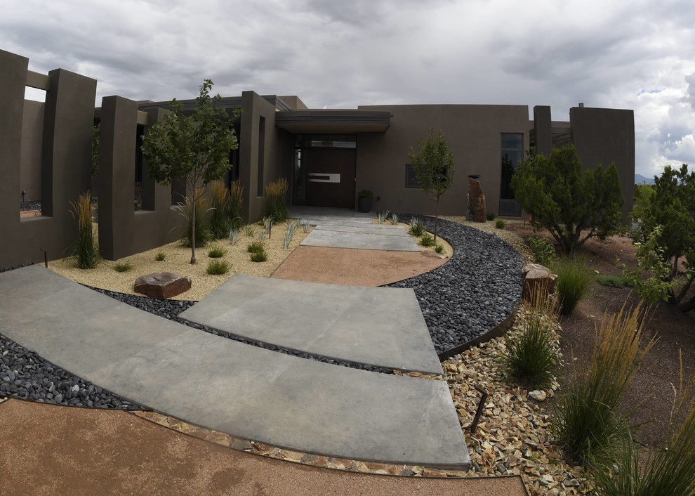 Home design - mid-sized contemporary home design idea in Albuquerque
