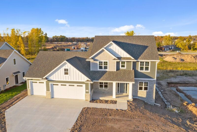 Mid-sized transitional gray two-story mixed siding gable roof idea with a shingle roof
