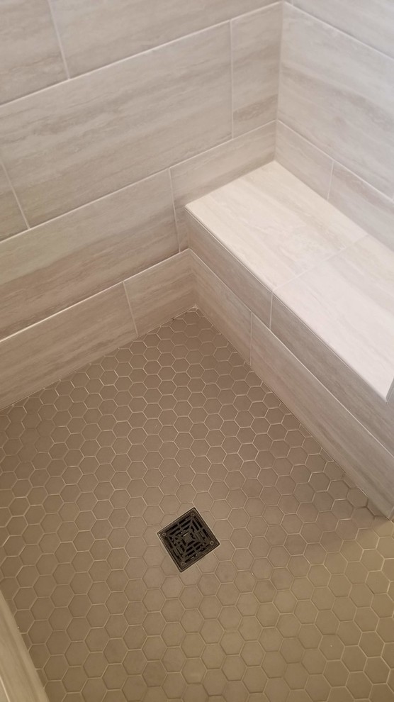 Design ideas for a mid-sized transitional master bathroom in Omaha with an alcove tub, an open shower, beige tile, beige walls, ceramic floors, an undermount sink, granite benchtops, grey floor, a shower curtain and brown benchtops.