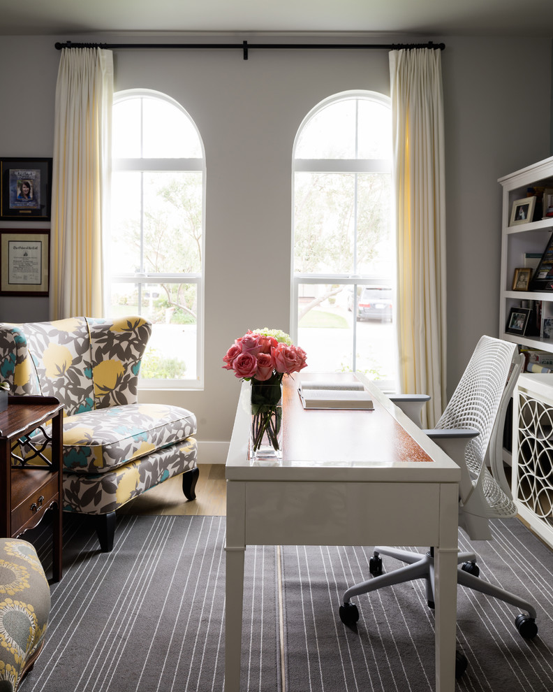 Design ideas for a transitional home office in Orange County.