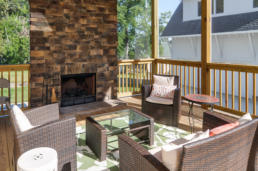 Large country backyard verandah in Nashville with a fire feature and a roof extension.