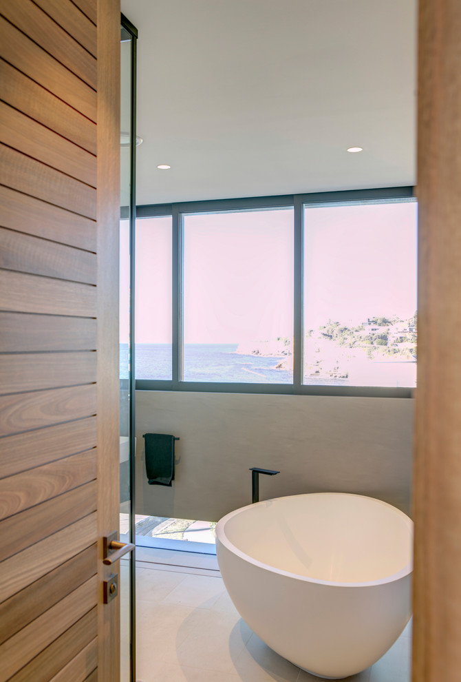 Mid-sized contemporary master bathroom in Sydney with a freestanding tub, a corner shower and an open shower.
