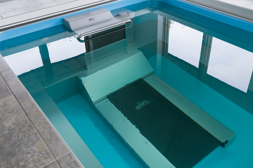 Pool house - mid-sized transitional indoor tile and rectangular lap pool house idea