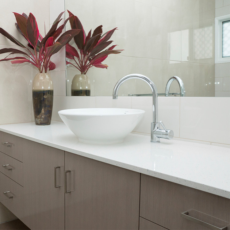 Bathroom - mid-sized transitional bathroom idea in Toronto with flat-panel cabinets, gray cabinets, white walls, a vessel sink and quartz countertops