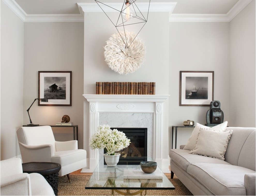 Inspiration for a transitional living room in San Francisco with grey walls, medium hardwood floors and a standard fireplace.