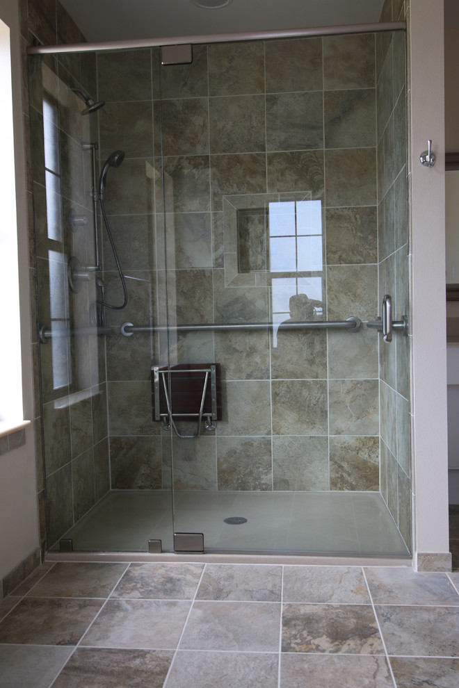 Inspiration for a large modern master bathroom in Austin with shaker cabinets, white cabinets, a corner shower, a one-piece toilet, beige tile, porcelain tile, beige walls, porcelain floors, an undermount sink and onyx benchtops.