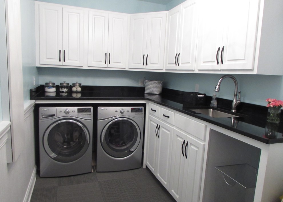 This is an example of a transitional laundry room in Other.