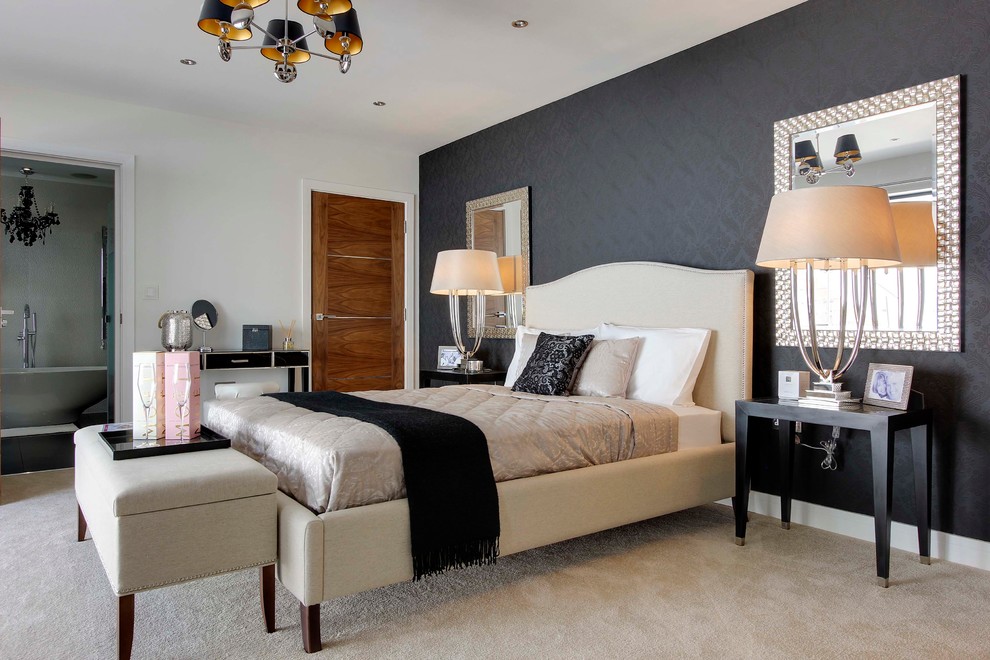 Contemporary master bedroom in Hertfordshire with black walls and carpet.