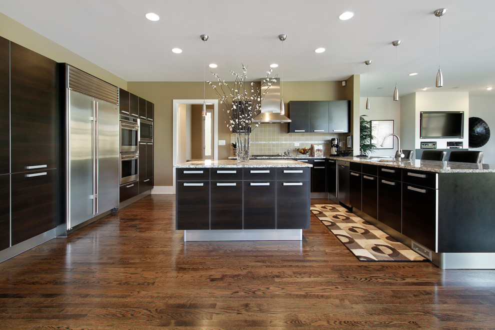 Inspiration for a large modern l-shaped open plan kitchen in DC Metro with flat-panel cabinets, black cabinets, granite benchtops, yellow splashback, ceramic splashback, stainless steel appliances, dark hardwood floors, with island and multi-coloured benchtop.