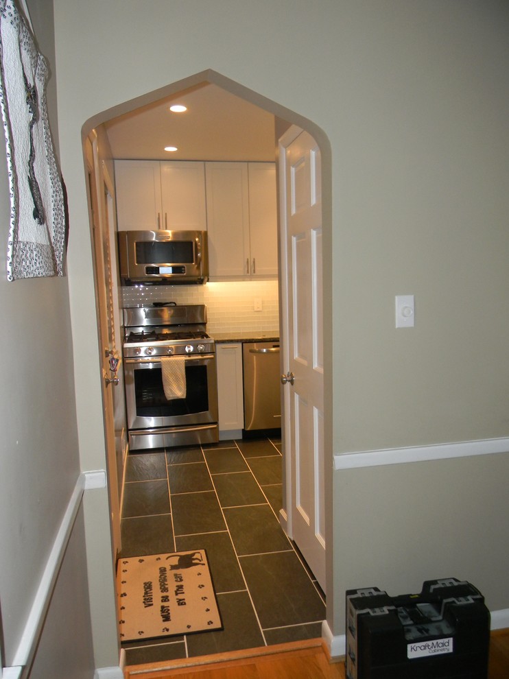 Example of a small transitional home design design in Baltimore