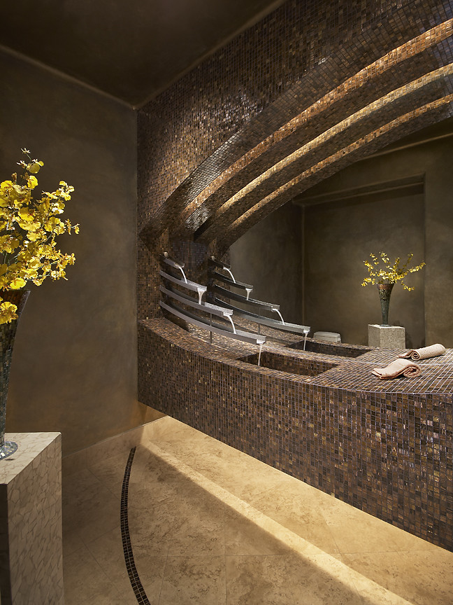 Inspiration for a contemporary powder room in Phoenix with an integrated sink.