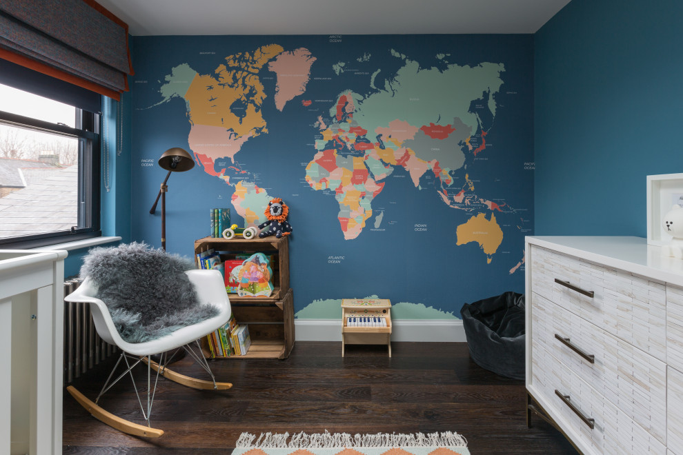 Mid-sized contemporary nursery in Gloucestershire with blue walls, dark hardwood floors and brown floor for boys.