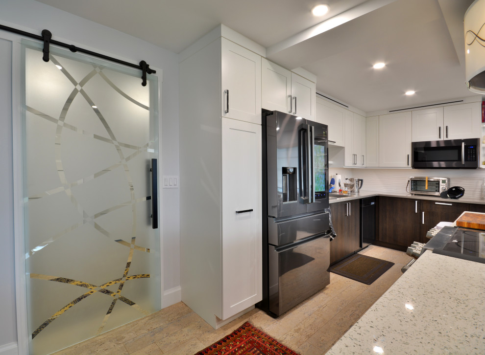 Photo of a large contemporary u-shaped eat-in kitchen in Miami with an integrated sink, shaker cabinets, white cabinets, recycled glass benchtops, white splashback, ceramic splashback, stainless steel appliances, cork floors, with island, beige floor and coffered.