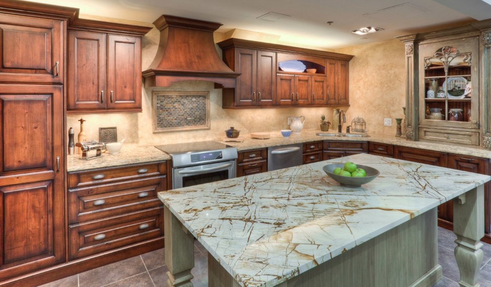 Inspiration for a large rustic u-shaped porcelain tile eat-in kitchen remodel in Toronto with an undermount sink, raised-panel cabinets, brown cabinets, quartz countertops, beige backsplash, stainless steel appliances and an island